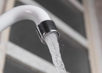 White kitchen sink faucet - Close up